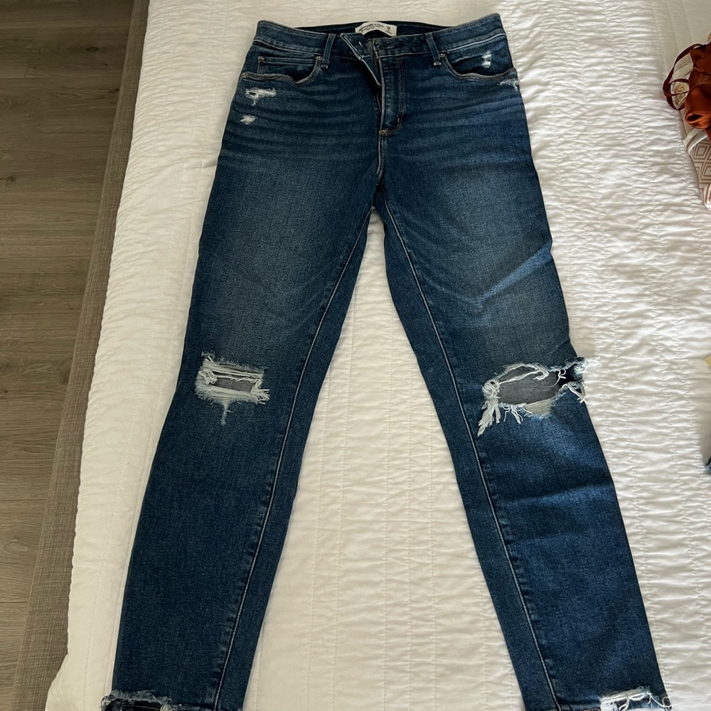 Women's Distressed Blue Jeans